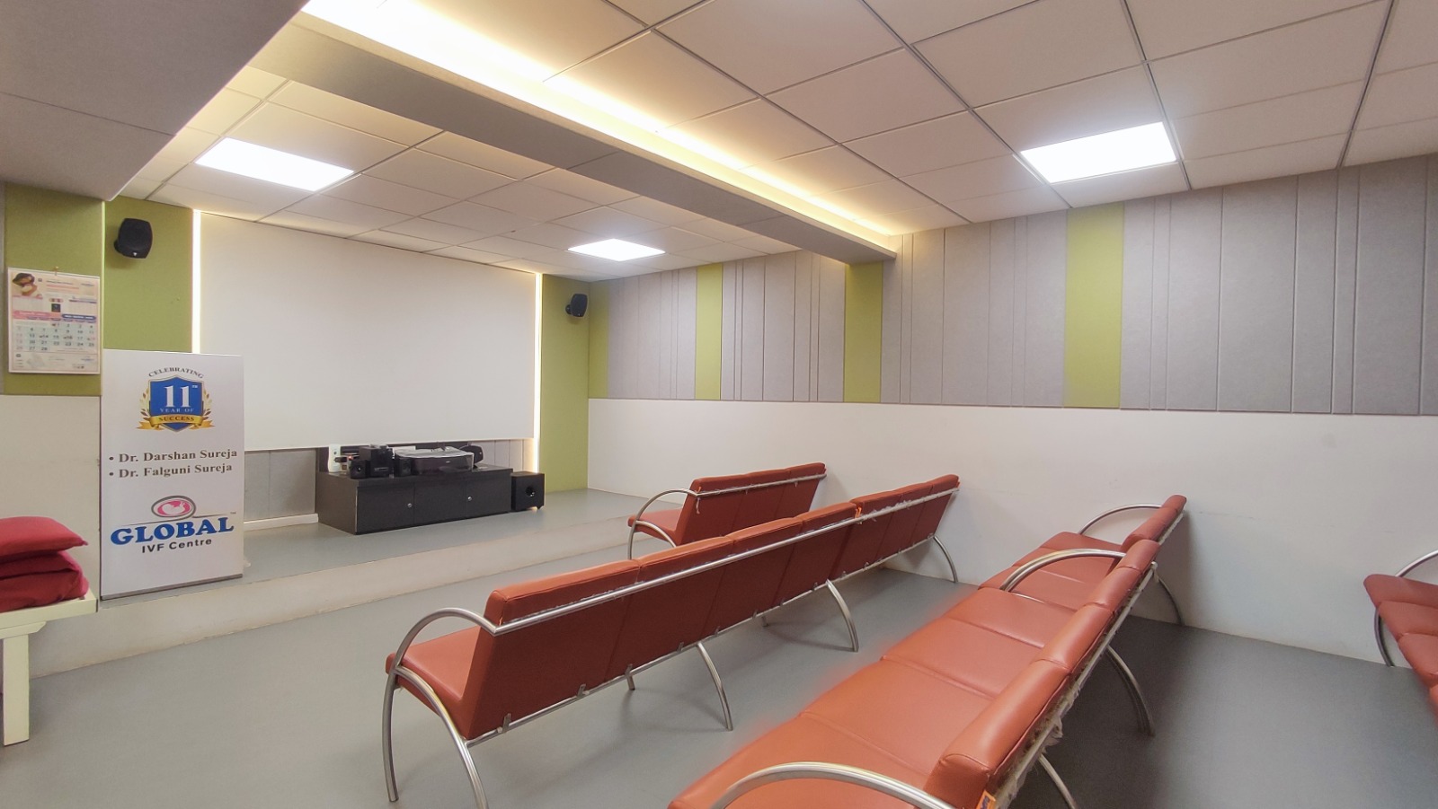 Meditation and counselling hall with theatre seating at Global IVF Centre Rajkot